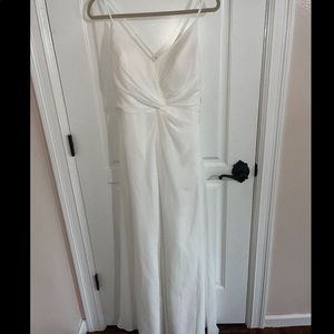 Brand new. Still has tags. Ivory white. Good length.